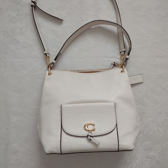 Coach Handbags - Coach chalk gold Remi refined pebble leather hobo crossbody bag